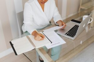 Girl writing something in her notes