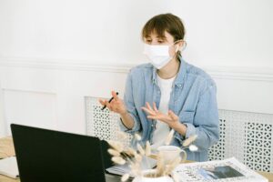 Girl talking to someone over laptop