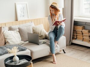 Girl is thinking and writing something