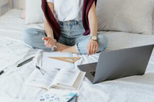 Girl on bed with her laptop